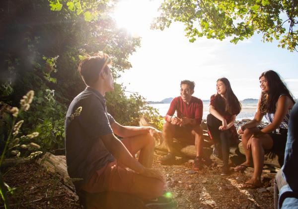 Students in a group at the beach